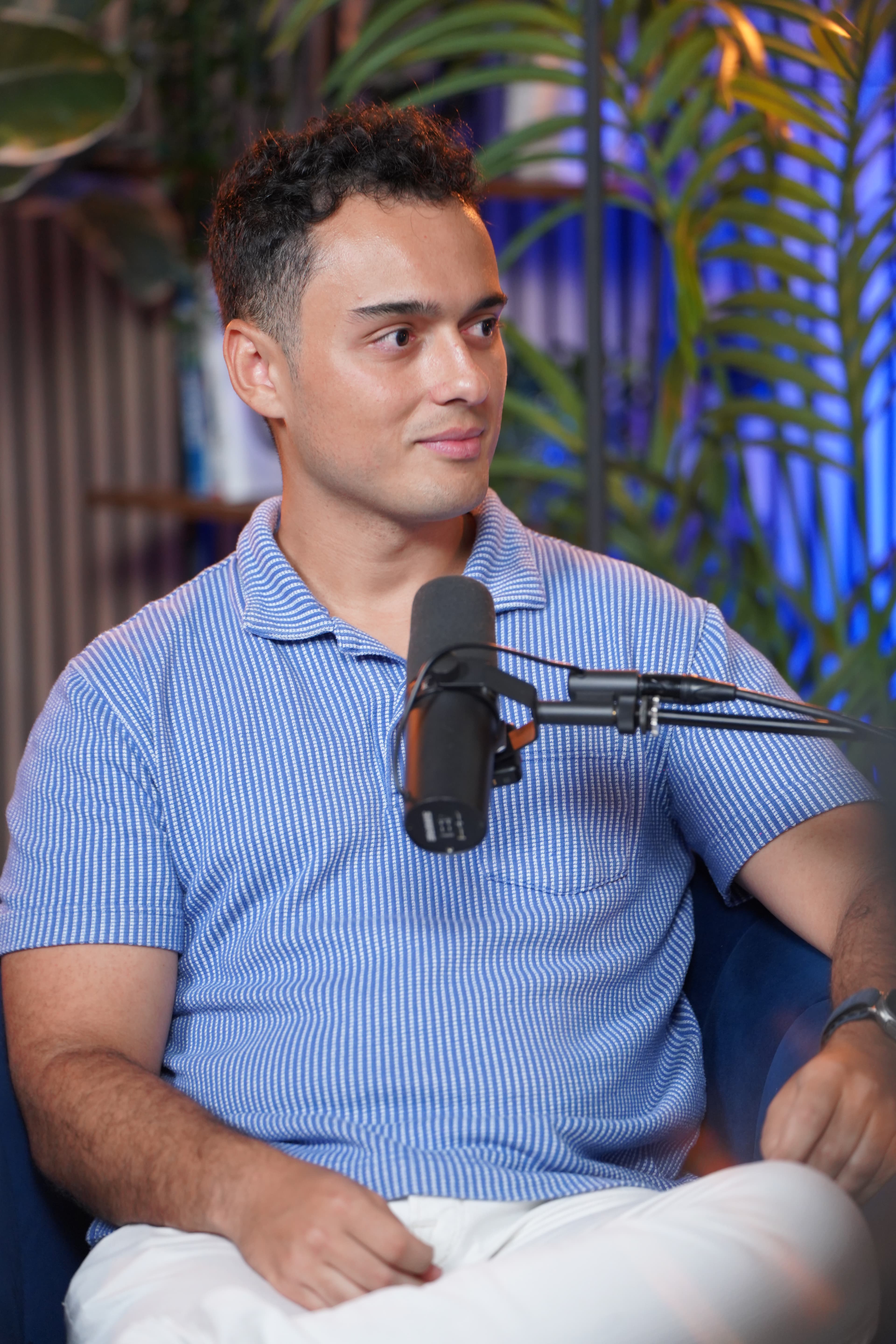 Jesus Martinez seated at the microphone during a JM Crypto conversation